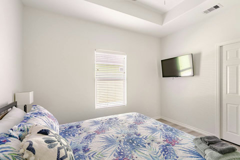 King bedroom with a smart TV