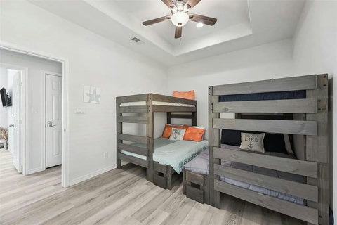 Bunk room with a TV