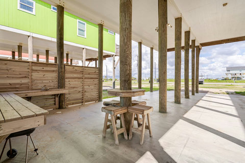 Shaded patio with high-top tables