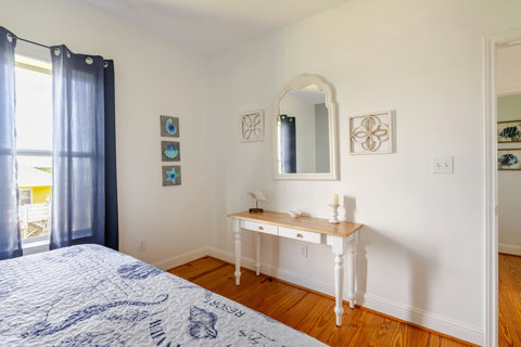 Bright bedroom with a writing desk