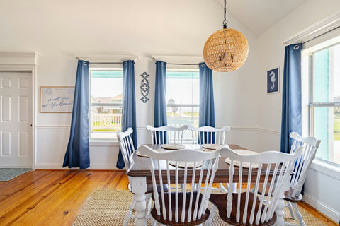 Dining table for six by the windows
