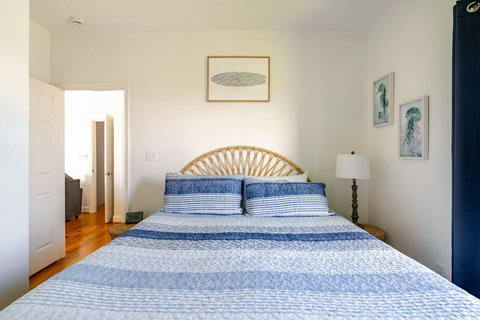 Bedroom with a rattan headboard