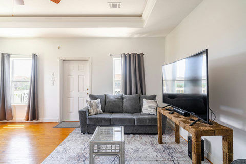 Second living room with a big TV