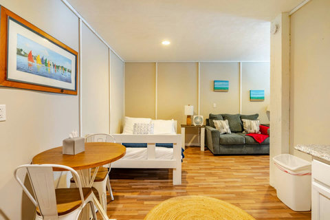 Bunk room with a cafe table