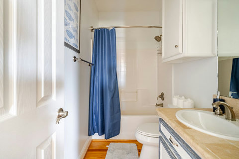 Hall bath with a tub-shower
