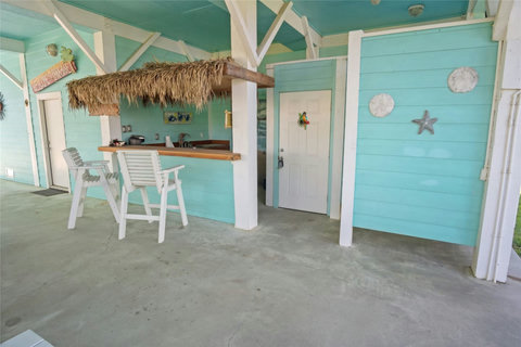 Bar seating by the tiki bar
