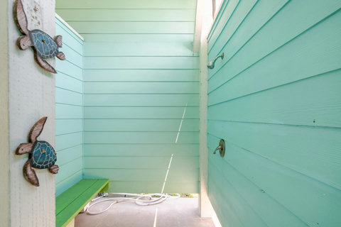 Outdoor shower to rinse off the sand