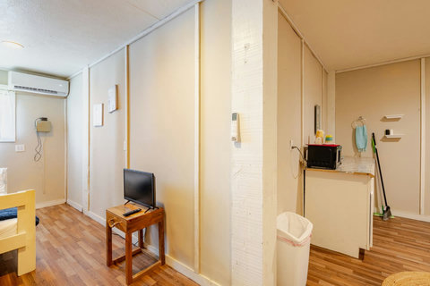 Bunk room with a mini fridge and microwave