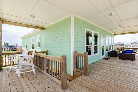 Covered deck with tall chairs