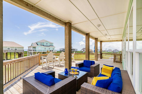 Covered deck with an outdoor lounge set