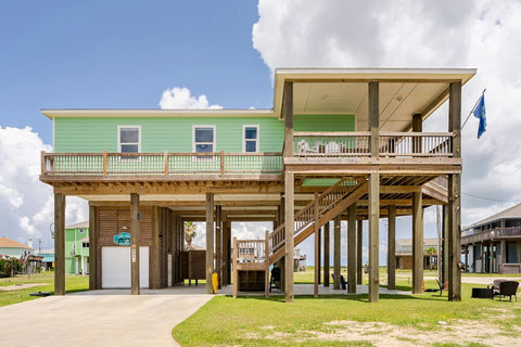 Raised beach house with parking underneath