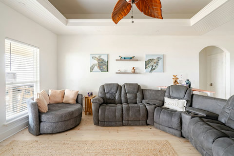 Plush sectional and swivel chair for movie night