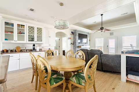 Dining table for six beside the living area