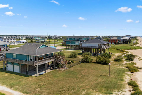 Aerial view of the house and dunes