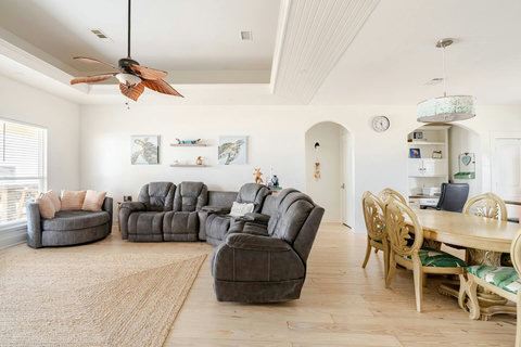 Living and dining share one bright, open room