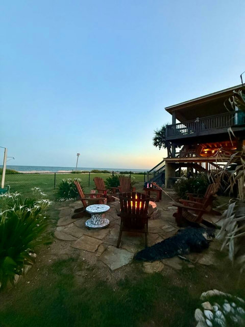 Fire pit glowing at dusk