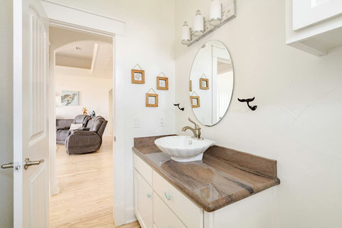 Hall bath with a vessel sink