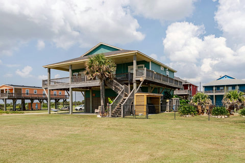 Stairs up to the wraparound deck