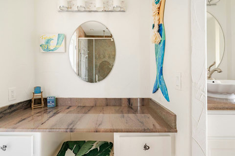 Hall bath vanity with coastal touches