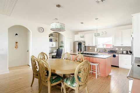 Dining table and kitchen in one open space