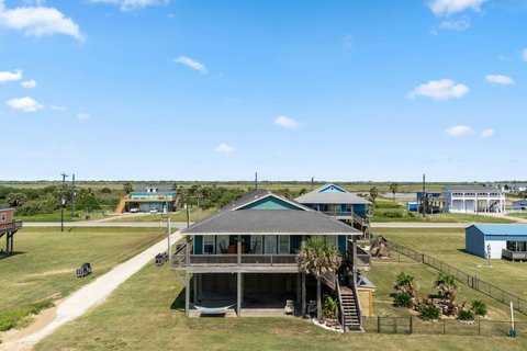 The house with its deck and stairs from above