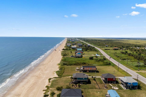 The shoreline stretching to the horizon