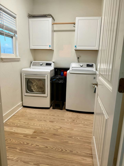 Laundry room with a full-size washer and dryer