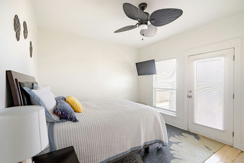 Queen bedroom with its own door to the deck