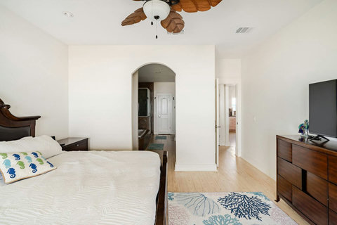 Primary bedroom opens to its own bath
