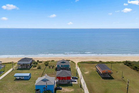Beachfront homes and open water
