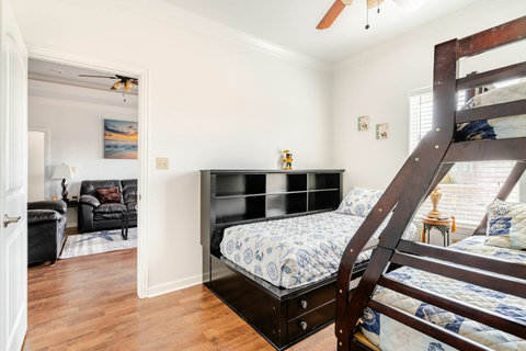 Bunk room with a view of the living room