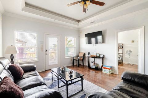 Leather sofas and a smart TV