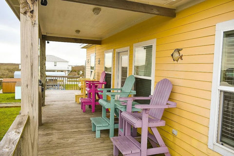 Colorful chairs on the covered deck