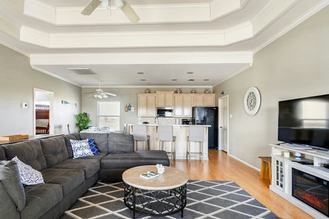Big sectional with the kitchen beside it