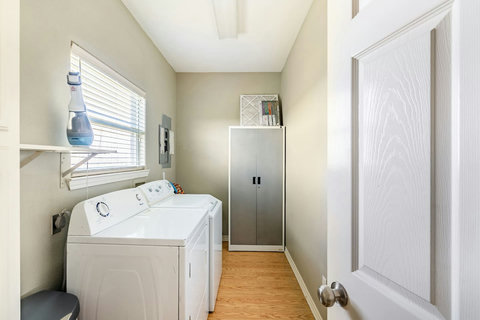 Laundry room with storage