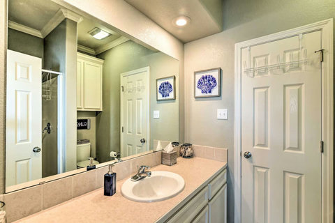 Bath with a vanity and closet