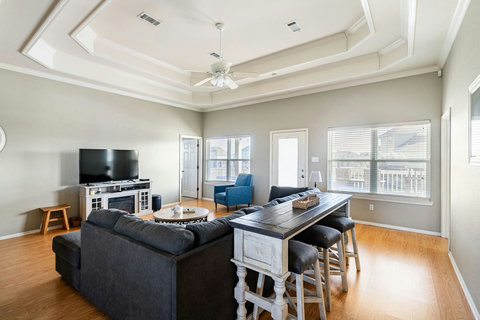 Sofa table with bar stools