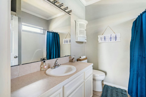 Hall bath with a tub-shower