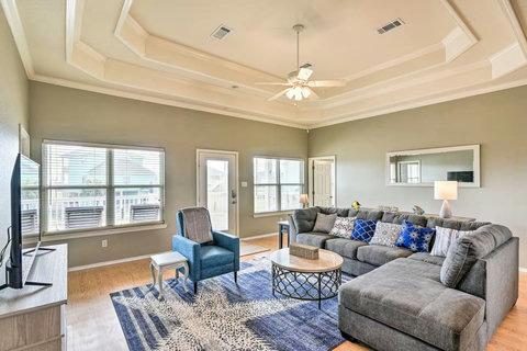 Sectional sofa, armchairs and a smart TV