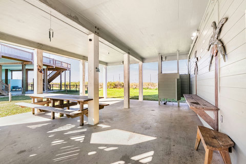 Shaded patio with picnic tables