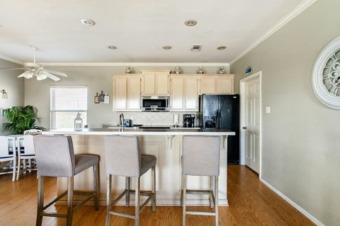 Breakfast bar with three stools