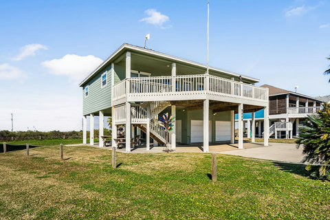 Wraparound deck and a big green yard