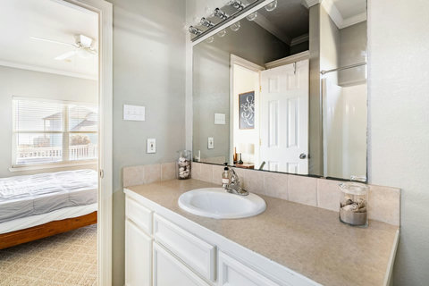 Bath vanity next to the bedroom