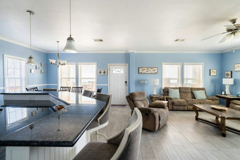Breakfast bar with a view of the living room