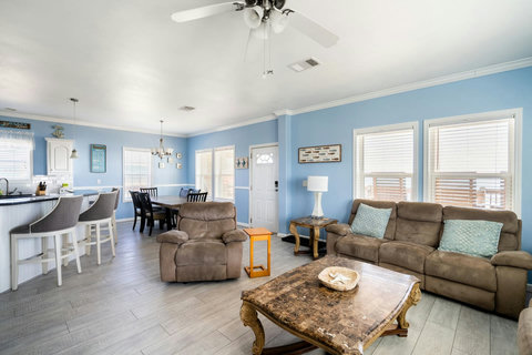 Living, dining and kitchen in one open space