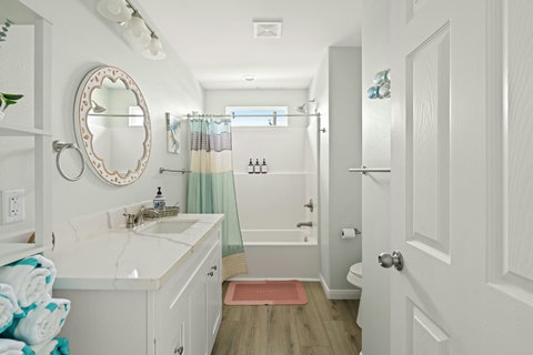 Hall bath with a tub-shower