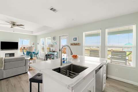 Kitchen island with a view of the living room