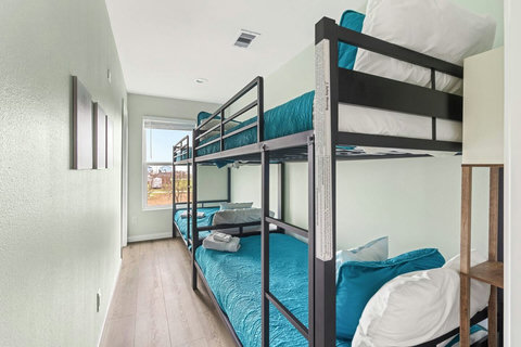 Bunk room with two sets of bunk beds