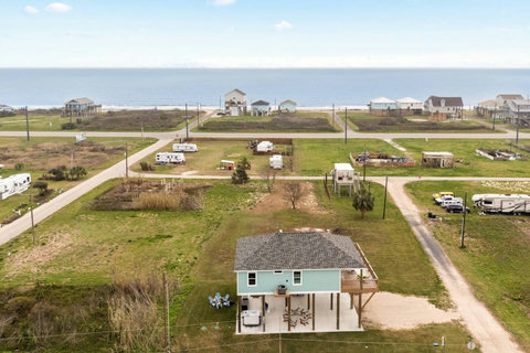 Aerial view of the house and the Gulf