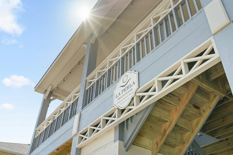 Covered deck with crisscross railings